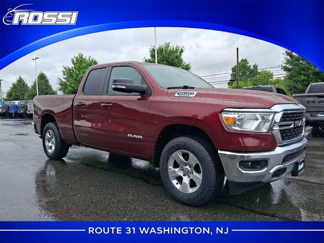 2022 RAM 1500 Big Horn 4x4 Quad Cab 6'4" Box in Delmonico Red Pearlcoat — front three-quarter view
