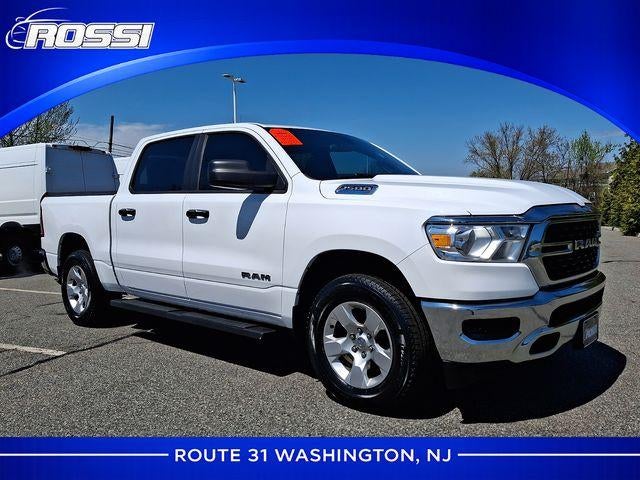 2023 RAM 1500 Big Horn 4x4 Crew Cab 5'7" Box in Bright White Clearcoat — front three-quarter view