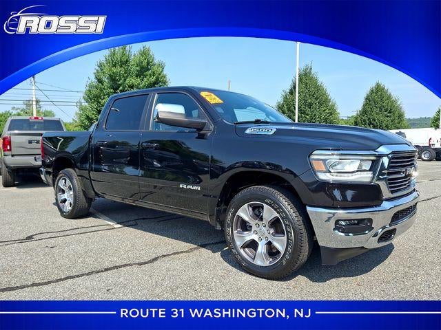 2023 RAM 1500 Laramie 4x4 Crew Cab 5'7" Box in Diamond Black Crystal Pearlcoat — front three-quarter view