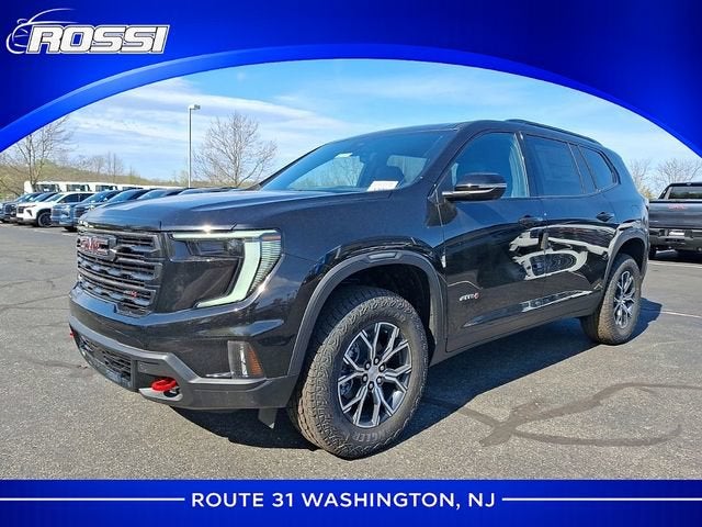 2026 GMC Acadia AT4 in Ebony Twilight Metallic — front three-quarter view