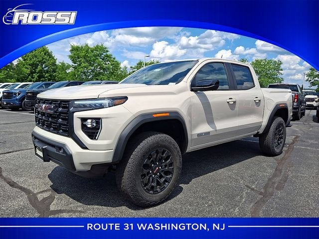 2026 GMC Canyon Elevation in Coastal Dune — front three-quarter view