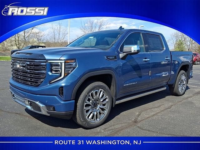 2026 GMC Sierra 1500 Denali Ultimate in Downpour Metallic — front three-quarter view